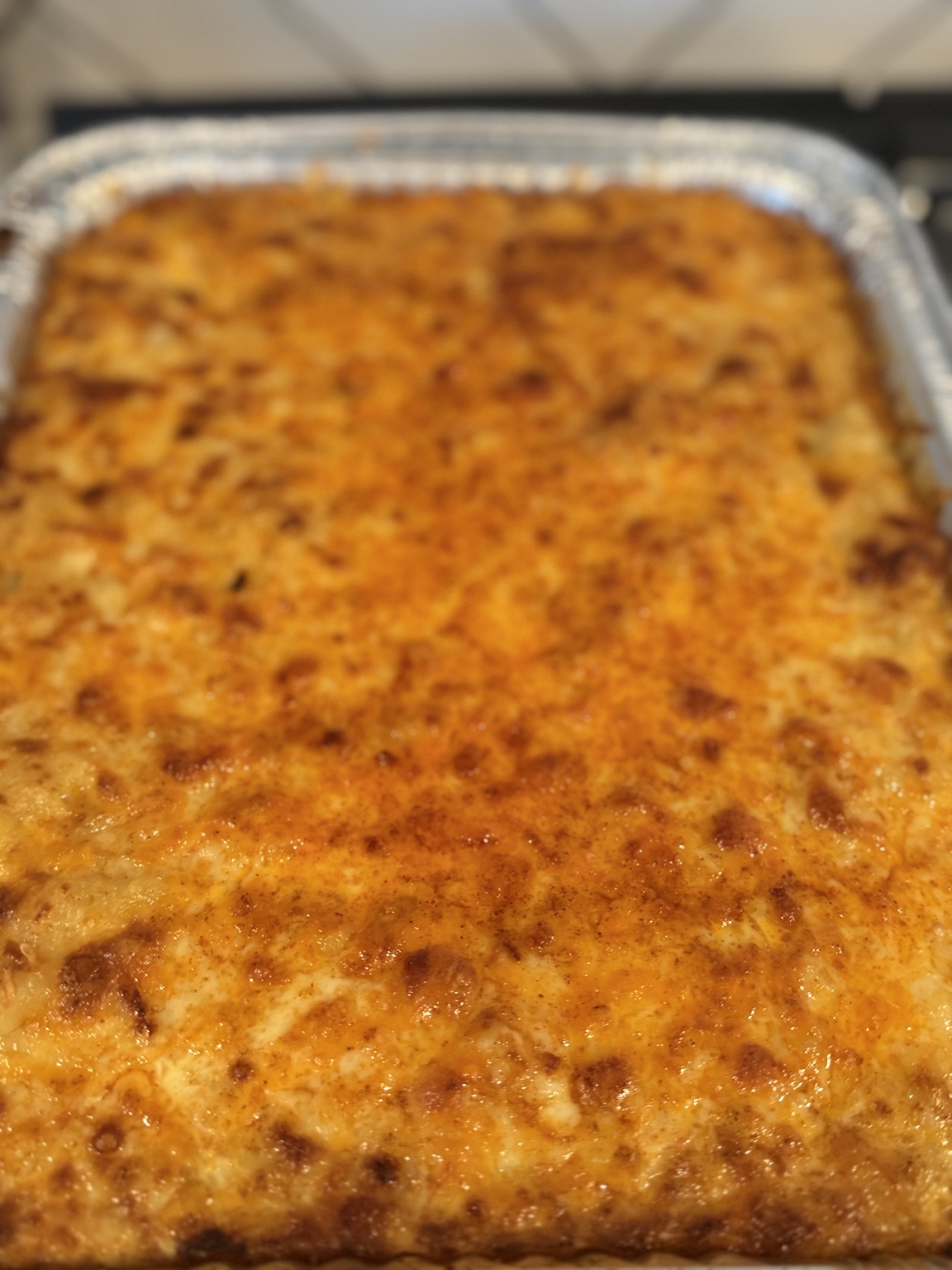A tray of golden baked mac and cheese